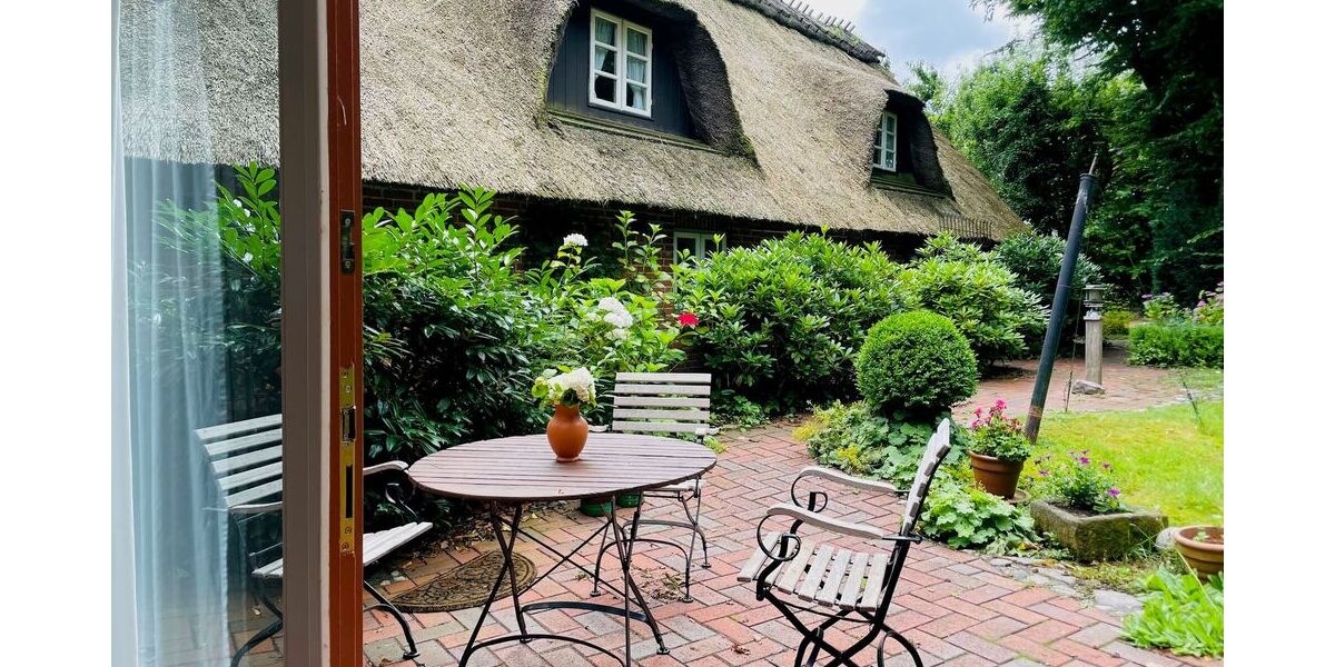 Traumhaftes Reetdach-Ein-Zweifamilienhaus mit parkähnlichem Garten in Angeln - Zweifamilienhaus Scheggerott | Angebot:26565370